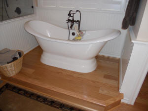 Laminate flooring in your bathroom and around your tub.